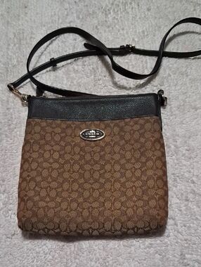 Coach North South Swingpack Signature Canvas Crossbody with Brown Leather Trim